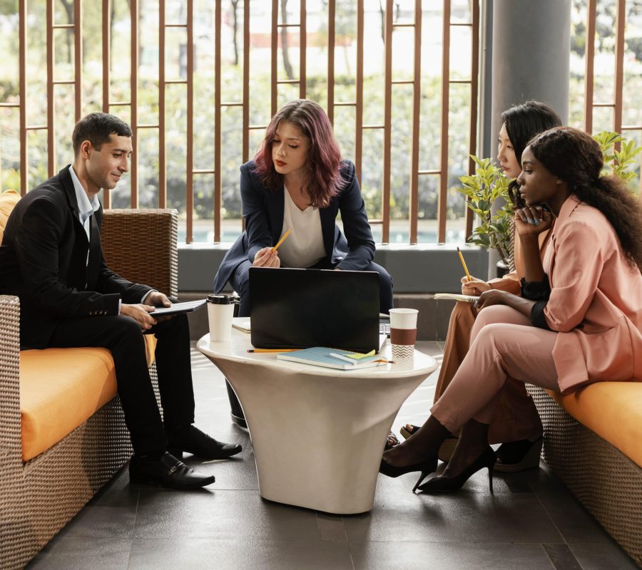 full-shot-woman-leading-meeting-indoors